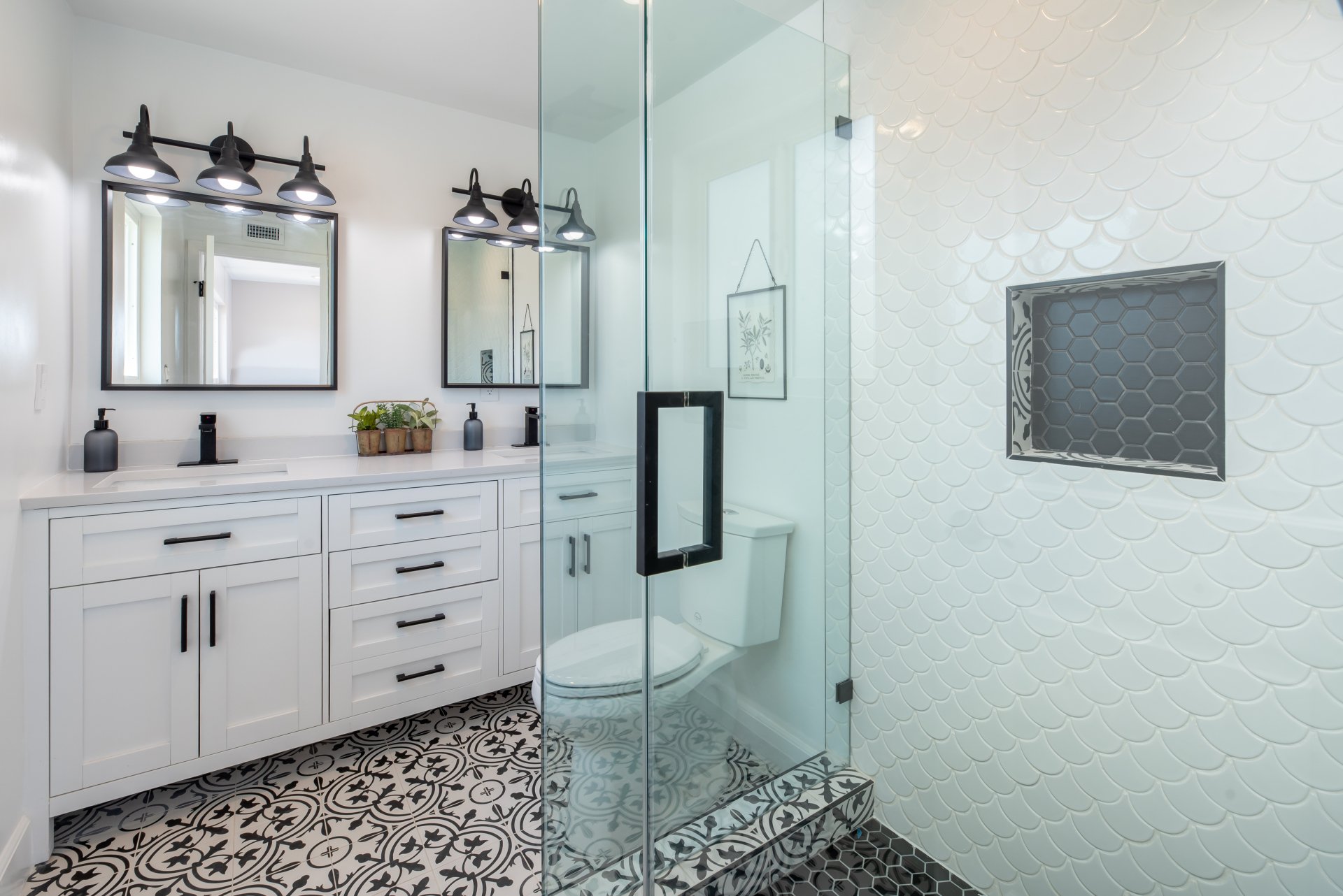 Freshly remodeled bathroom with modern fixtures and clean tile work